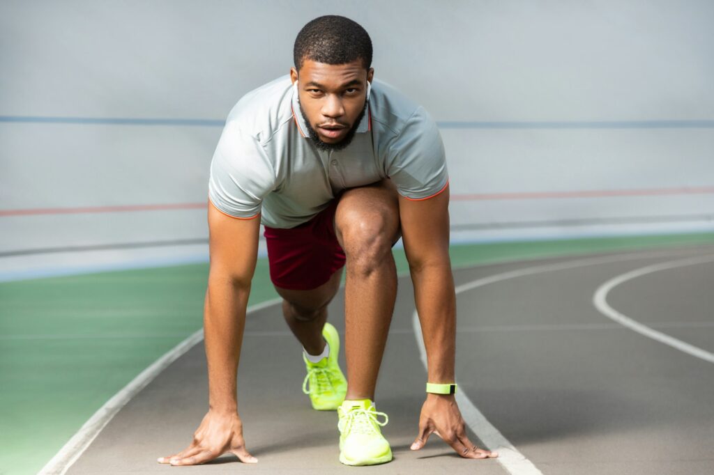 Focused fit professional young African American male runner